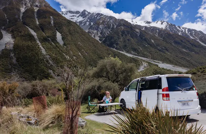 Wicked campervan camp setup beneath the mountains near Mount Cook